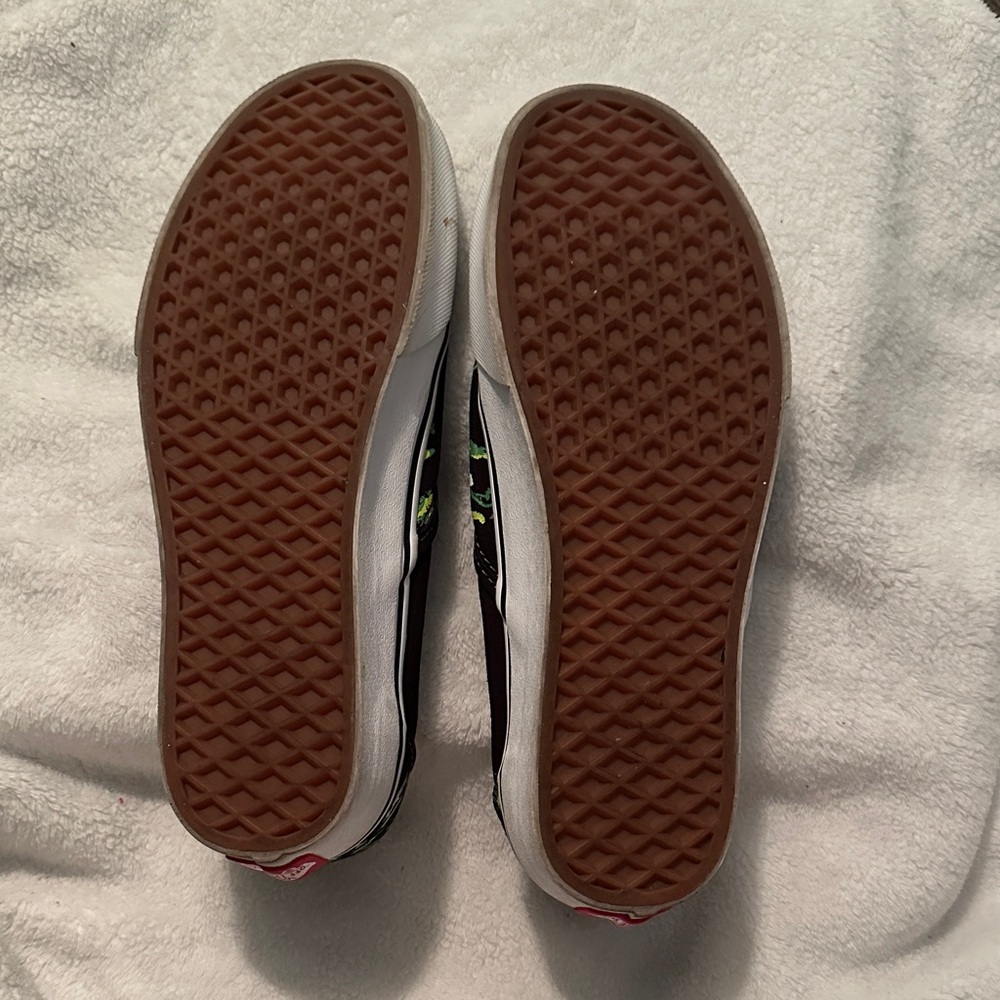 Vans Black Slip-Ons with Green Eye Pattern - Picture 2 of 3